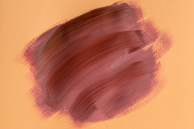 Abstract Brush Stroke on Orange Background – Free Download