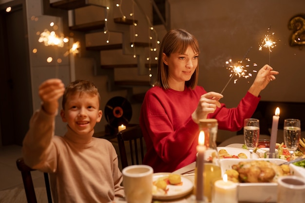 Medium Shot of a Kid and Mother at the Table – Free Stock Photo for Download