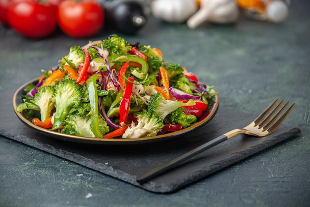 Delicious Vegan Salad with Fresh Vegetables and White Flowers on Dark Background – Free Stock Photo for Download