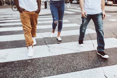 Streetwear Fashion: Jeans for Men and Women Crossing City Streets – Free Download