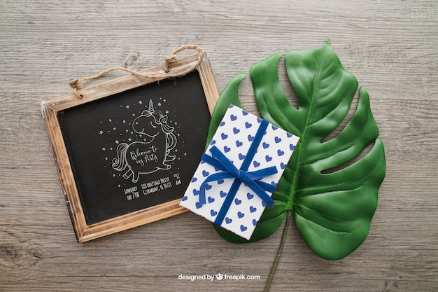 Chalkboard and Gift Box on a Leaf – Free Stock Photo, Download for Free