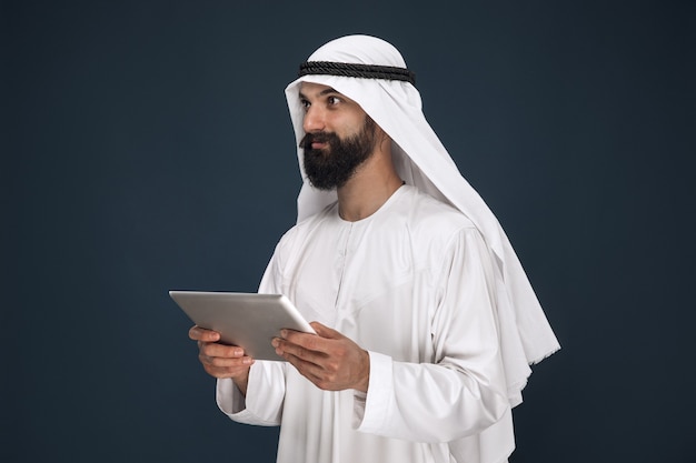 Half-length Portrait of Arabian Saudi Businessman | Young Male Model with Tablet | Free Stock Photo for Download