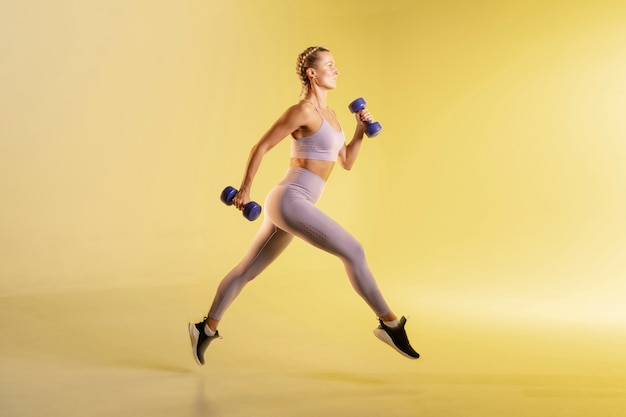 Young Woman Training with Weights – Free Stock Photo Download