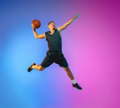 Young Basketball Player in Neon Light – Free Stock Photo for Download