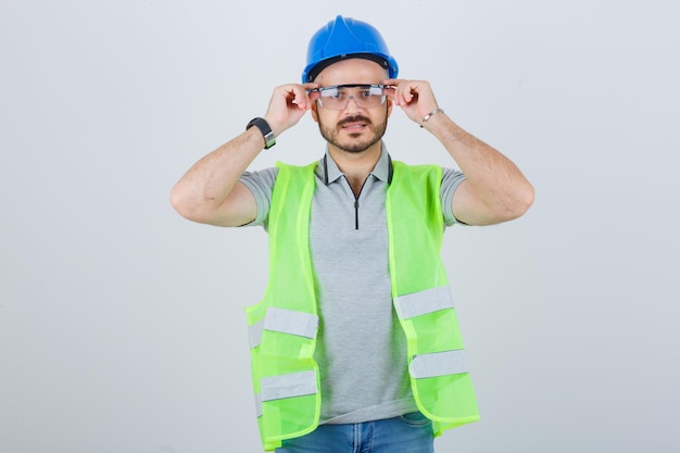 Young Construction Worker in Safety Helmet and Glasses – Free Download