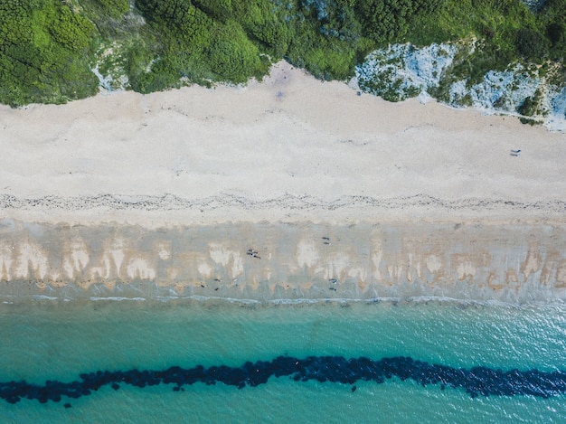 Overhead View of Bowleaze Cove Beach and Sea in Weymouth, UK – Free Download