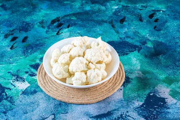 A Bowl of Cauliflower on a Trivet – Free Stock Photo for Download