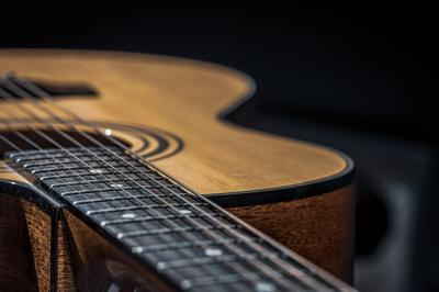 Acoustic Guitar Fretboard with Strings on Black Background – Free Stock Photo for Download