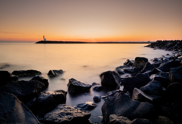 Stunning Sunset Over a Foggy Port – Free Stock Photo for Download