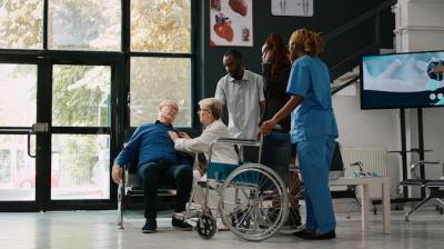 African American Individuals Assisting Elderly Man for Medical Checkup – Free Stock Photo for Download