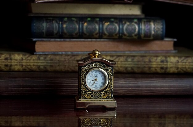 Close-Up of a Clock on Table – Free Stock Photo for Download