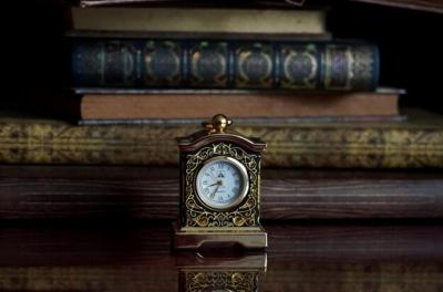 Close-Up of a Clock on Table – Free Stock Photo for Download