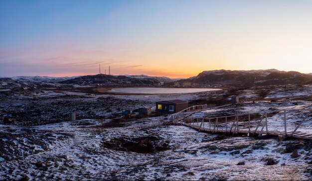 Magenta Winter Dawn: Panoramic Icy Landscape and Mountains in Teriberka, Russia – Free Download