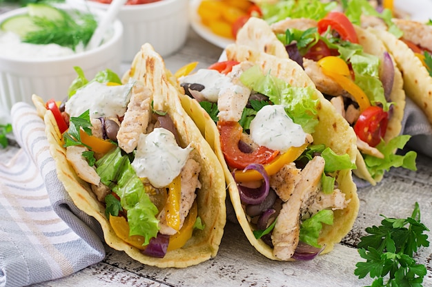 Mexican Tacos with Chicken, Bell Peppers, Black Beans, and Fresh Vegetables – Free Stock Photo Download