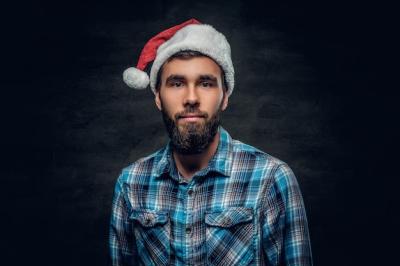 Bearded Male in Plaid Shirt and Santa’s Hat – Free Download