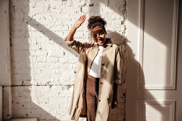 African Woman Shielding Eyes from Sun Rays – Free Download