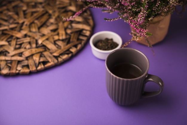 Black Tea with Herbs on Purple Background – Free Stock Photo for Download