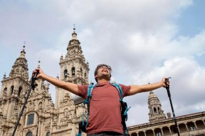 Handsome Male Traveler at a Historical Cathedral – Free Download