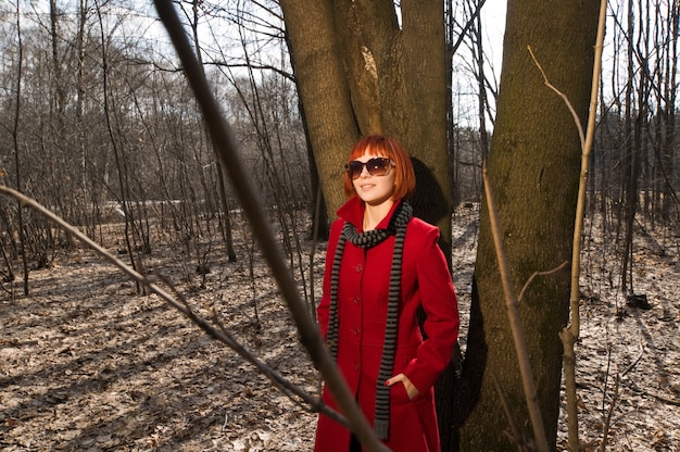 Beautiful Girl in Red Coat and Sunglasses – Free Stock Photo Available for Download