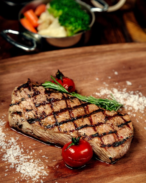 Deliciously Cooked Steak on a Wooden Board – Free Download