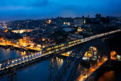 Famous LuÃ­s I Bridge at Night in Porto, Portugal – Free Download