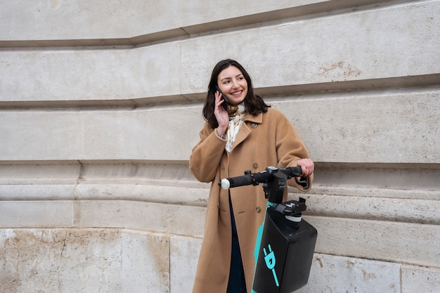 Person Riding an Electric Scooter in the City – Free Download