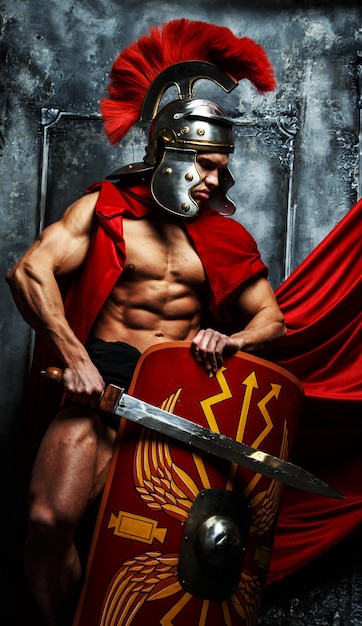 Roman Warrior with Muscular Body Holding Sword and Shield – Free Download