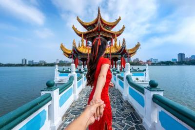 Women Tourists Guiding Their Partners to Kaohsiung’s Top Attractions – Free Download