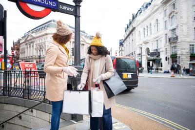 Medium Shot of Women Holding Shopping Bags – Free Download