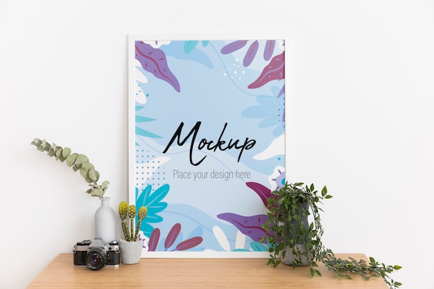 Indoors Arrangement Featuring a Mock-Up Frame and Plant – Free Stock Photo Download