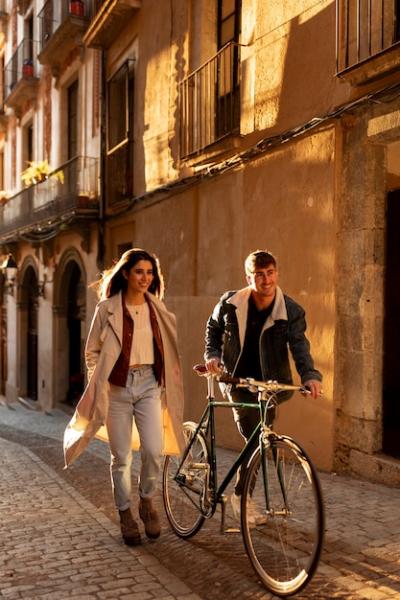 Couple Walking with Bicycle – Free to Download Stock Photo