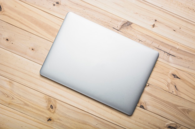 Laptop on Wooden Plank – Free Stock Photo for Download