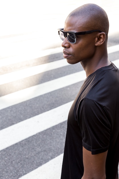 Young Male Athlete in Black Shirt and Sunglasses – Free Stock Photo for Download