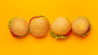 Top View Burgers on Orange Background – Free Download