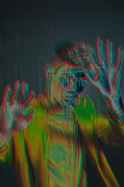 Portrait of Young Man with Glitch Effect – Free Download