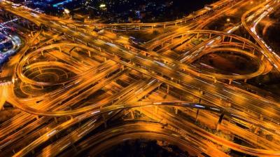 Aerial View of Nighttime Traffic on a Major Highway Intersection – Free Stock Photo, Download Free