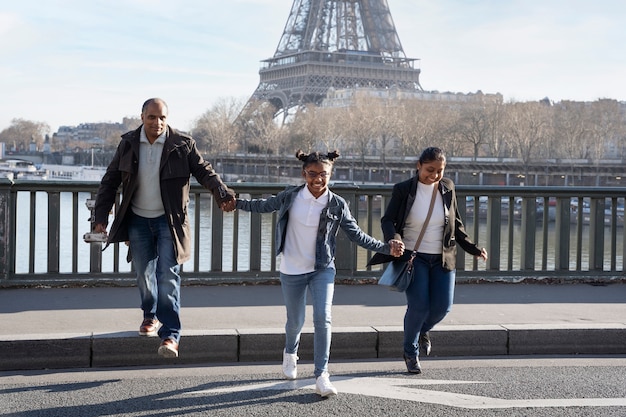 Family Enjoying Their Trip to Paris – Free Download