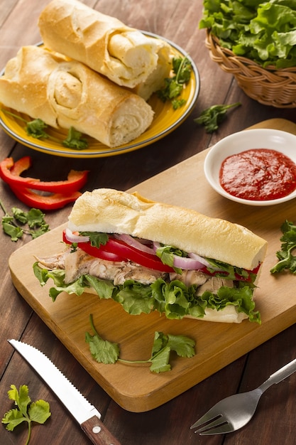 Baguette Sandwich with Onions, Peppers, Lettuce, and Cooked Chicken â Free Stock Photo, Download Free