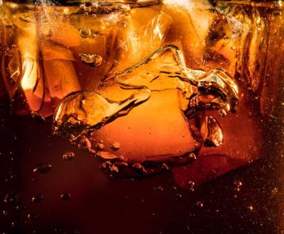 Close Up of Ice Cubes in Dark Cola: Refreshing Summer Drink Texture – Free Download