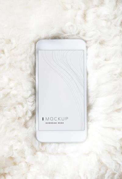 Mobile Phone Screen Mockup on Fur Surface – Free Stock Photo for Download