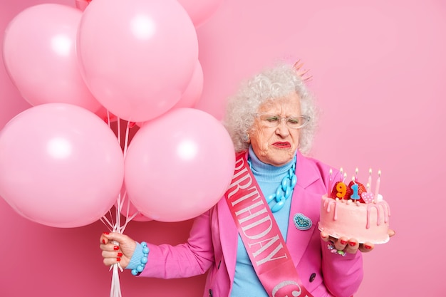 91st Birthday Celebration: Elderly Woman Reflects on Aging with Cake and Balloons – Free to Download