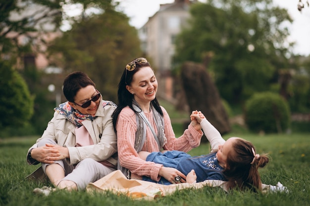 Grandmother, Mother, and Daughter Enjoying a Picnic in the Park – Free Stock Photo for Download