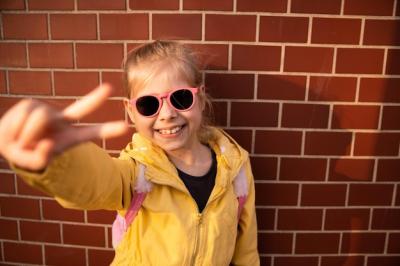 Young Girl in Sunglasses Captured in Full View – Free Download