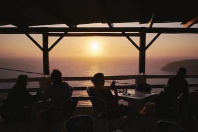 Silhouette of People Enjoying Sunset at Potamos Beach, Greece – Free Stock Photo for Download