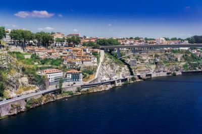 Sea Surrounded by Buildings and Greenery in Porto, Portugal – Free Download