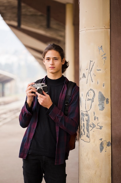 Handsome Traveler at Railway Station – Free Stock Photo for Download