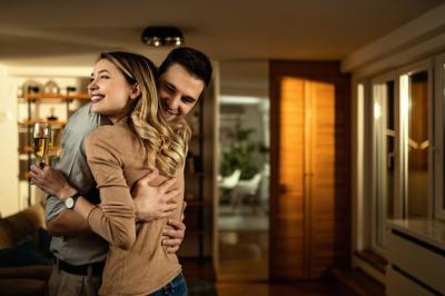 Happy Couple Embraced in a Romantic Living Room at Night – Free Stock Photo, Download Free