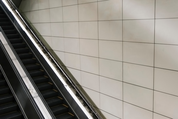 Blank Tiled Wall with Escalator – Free Stock Photo for Download