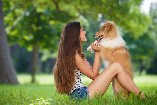 Pretty Woman with Dog Outdoors – Free to Download