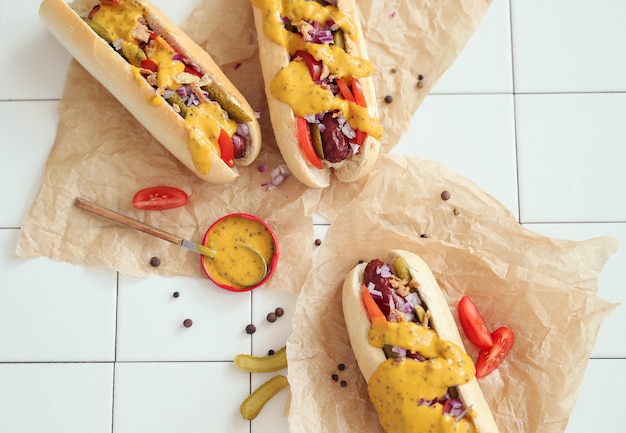 Delicious Hot Dog with Sauce on White Surface – Free Stock Photo, Download Free